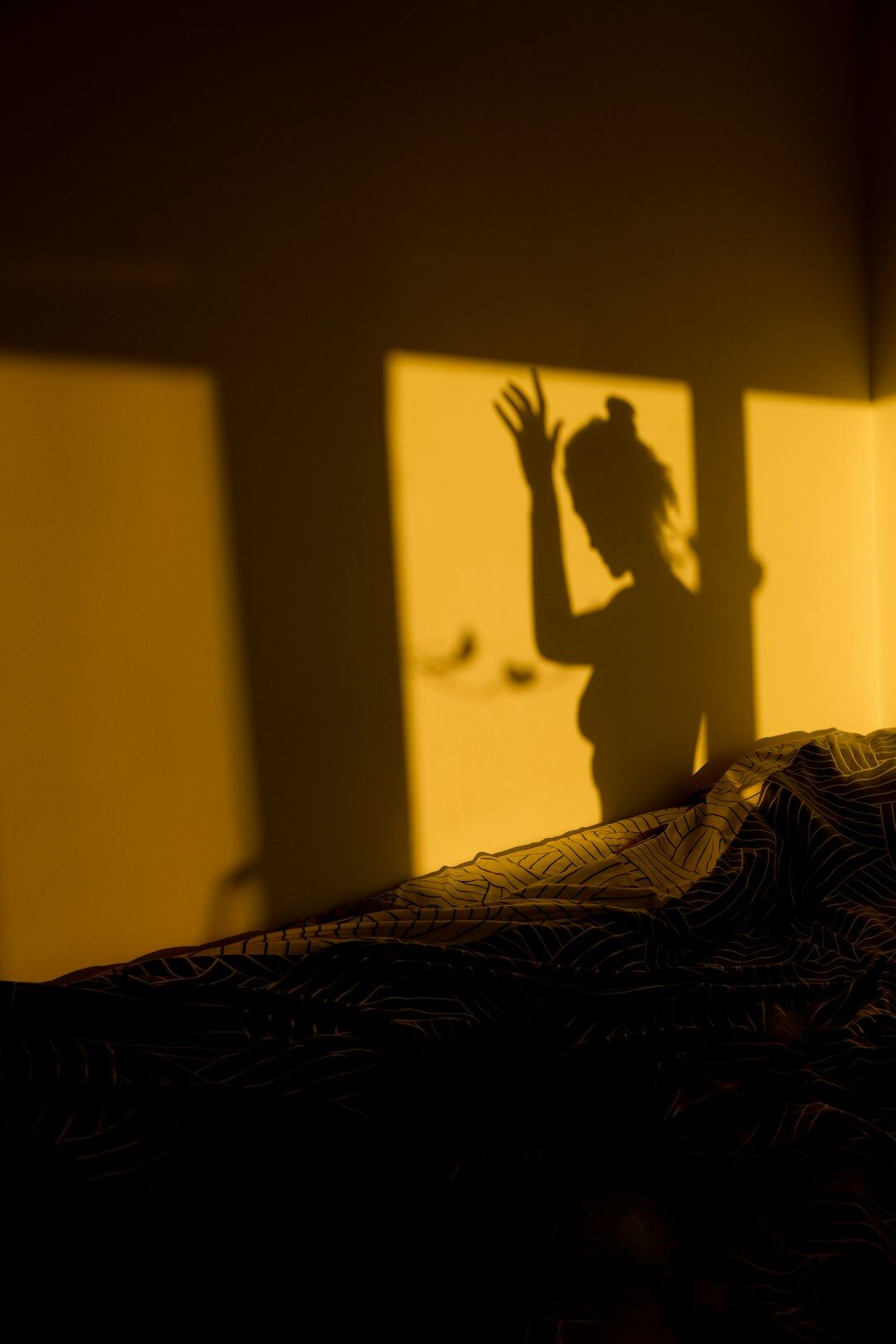 anxious person in shadow
